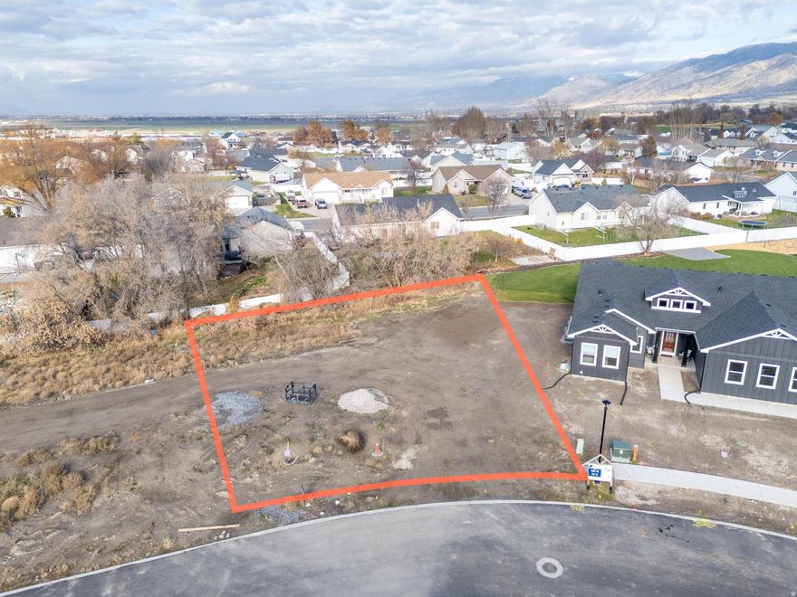 LOT 85   Mount Sterling Farms is a picturesque community located in Hyrum, Utah. This community has the best in homes, parks, and views. One of the parks has a splash pad, pickleball and basketball courts!  Mount Sterling Farms offers homeowners a chance to escape the busy, fast-paced city life, and live where kids can spend their days playing outside with friends at the park or on the splash pad. There's a lot to do in your own neighborhood, and there are many different types of outdoor recreation just minutes away! If you are looking to build a new home in Hyrum, you will find everything you are looking for in this exclusive neighborhood.