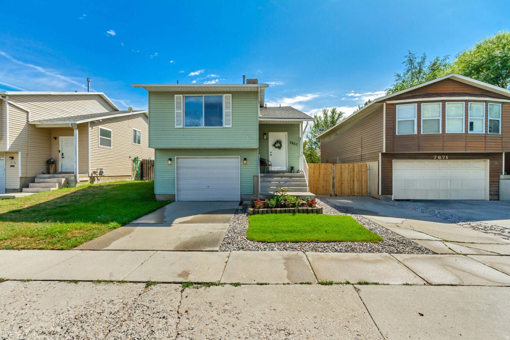 Photo of 7667 S SUNRISE PL W, West Jordan, UT 84084 (MLS # 2181780)