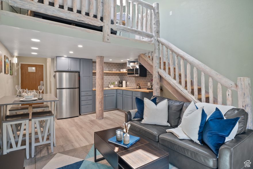 This stylish and updated loft in the desirable Prospector Square Condominium community offers the perfect balance of mountain charm, modern comfort, and flexible use. Renovated in 2021, the condo features thoughtful upgrades and a clean, contemporary feel. With vaulted ceilings and an open floor plan, the residence is both comfortable and inviting  an ideal retreat after a day on the slopes, trails, or around town. With an unbeatable location, it is just steps from restaurants, coffee shops, and local services, while the free Park City bus line outside provides quick access to two world-class ski resorts, endless scenic trails, and historic Main Street in Old Town.  The property is offered fully furnished and has operated as a nightly rental, creating an excellent option for buyers seeking a vacation getaway, income property, or full-time residence. The open kitchen and living area feature modern finishes, while the loft-style sleeping area provides a private and comfortable place to unwind. A small sitting deck off the living area extends the space outdoors and offers a perfect spot to enjoy fresh mountain air.  Prospector Square Condominiums is a well-established and sought-after community, valued for its accessible location and easy lifestyle. Its popularity with both visitors and residents support strong rental demand. Whether envisioned as a personal mountain retreat, an income-producing property, or a low-maintenance primary residence, this updated loft offers a rare combination of convenience, flexibility, and lifestyle in one of Park City's most desirable neighborhoods.  All information contained in listing, including sq. ft., provided as a courtesy and is not guaranteed. Buyer is responsible for verifying all information herein to his/her satisfaction, obtaining independent measurements and appraisals as necessary.
