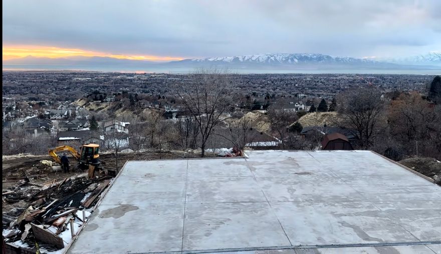 Builder/Investor Special! Ready to be built custom home with epic views on 1 Acre! Photos of the home are the old home that was torn down. Perched on nearly an acre in one of Provo's premier neighborhoods, this property offers panoramic vistas of Utah Lake, gorgeous mountains and the valley below. The original home has been cleared, paving the way for your dream rebuild, with architectural plans already drawn. Just minutes from the Riverwoods, Provo River, Provo Canyon, Brigham Young University and top-tier private schools, this is a rare opportunity to craft a residence in an unbeatable setting. Seller Financing available with 50% down, 2-3 year term at 6% interest. Call Agent for Details. The original home burned and has been torn down. The foundation has had 60 foot piers installed and is ready for foundation wall repairs and framing to begin. The lot next door is included in the sale parcel #52:166:0079 for a total of .94 acres. Engineering and architectural plans and reports done and will be provided. Seller is moving out of state and