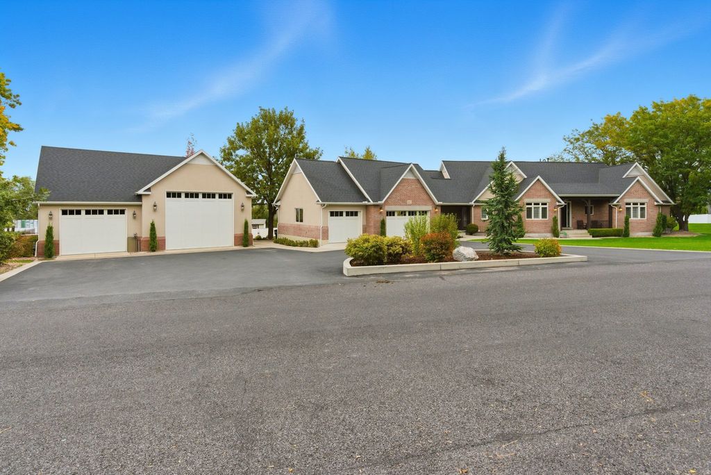 Photo of 5873 S JORDAN CANAL RD, Taylorsville, UT 84129 (MLS # 2152134)