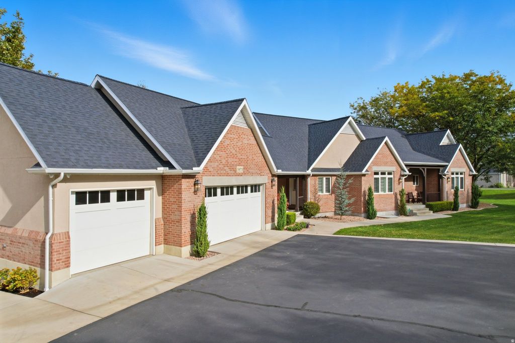 Photo of 5873 S JORDAN CANAL RD, Taylorsville, UT 84129 (MLS # 2152134)