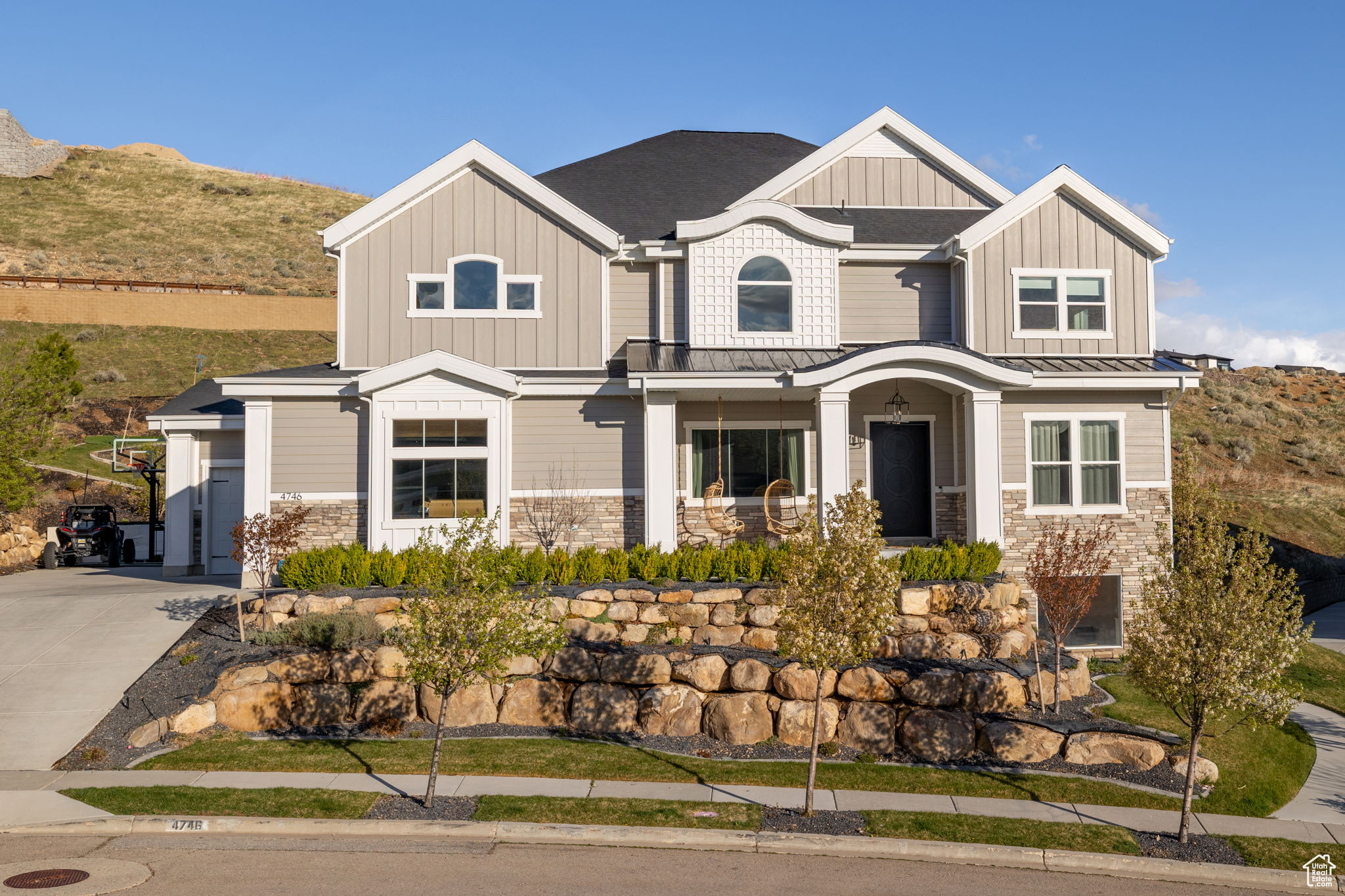 Welcome to one of Lehi's most prestigious neighborhoods-Traverse Mountain's coveted Vialetto community! This stunning custom Silverhawk home is tucked into a quiet cul-de-sac and sits on nearly a full acre, offering an incredible combination of luxury, privacy, and space. The fully finished backyard is a true retreat, complete with a spa, playset, chipping and putting green, and plenty of room to entertain or unwind in your own private park-like setting. Inside, you'll find an open and thoughtfully designed layout with 10-foot ceilings, a home office, and a dream kitchen featuring a massive island, butler's pantry, quartz countertops, floor-to-ceiling cabinetry, and hardwood flooring throughout. The spacious upstairs layout includes a vaulted master suite, double laundry, and four additional large bedrooms with two additional full bathrooms. The fully finished basement has been beautifully finished and includes a theater room, playroom, and salon-with potential to convert into a full mother-in-law apartment. The oversized 3-car garage is epoxy-coated and offers plenty of space for storage or hobbies. Conveniently located near upscale shopping, restaurants, Silicon Slopes, and miles of hiking and biking trails, this home blends elegant living with unmatched access to Lehi's best amenities. Don't miss your chance to experience it all!   Square footage figures are provided as a courtesy estimate only and were obtained from County Records.  Buyer is advised to obtain an independent measurement.