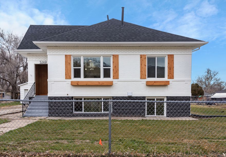 This incredible Ogden home has been completely renovated and is loaded with upgrades! Nearly everything is brand new - including a 30-year roof, windows, A/C, furnace, water heater, electrical, plumbing, and all new flooring. The basement is perfectly set up for a mother-in-law apartment with a separate entrance. Both kitchens are spacious and beautifully updated with new cabinets, quartz countertops, and stainless steel appliances. Situated on a .30-acre lot in a great neighborhood, this home is just steps from a newly renovated Ogden park. The fully fenced yard offers plenty of space to enjoy, plus a large 2-car garage with ample storage.  This is a rare opportunity to own a turnkey home with income potential in an unbeatable location. Come see it today!   Owner/Agent.