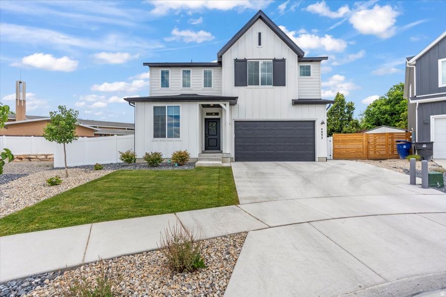 Open House Saturday March 14th 11am-1pm. This stunning home, built in 2024, offers the perks of brand-new construction with all the finishing touches already completed for you. From the fully landscaped and fenced yard to the spacious patio and low-maintenance gravel pathways-there's no mud and no work left to do! Inside, you'll find a bright, open-concept two-story floor plan featuring 5 bedrooms and 3 bathrooms across the main levels. The basement offers room to grow and can be customized to fit your lifestyle-whether that means a home theater, gym, or extra living space. The owners have thoughtfully upgraded the home with stylish finishes and modern touches, including custom window coverings and a complete set of kitchen appliances-yes, the fridge is included! Every detail has been carefully selected with an eye for design, so all you need to do is move in and enjoy. Located on the best lot in the subdivision, the home backs to plenty of open space with a church off in the distance and offers a private, peaceful backyard retreat. Notable Upgrades Include: Tesla Level 2 Charger  Convenient at-home EV charging Epoxy-Coated Garage Floors  Durable, clean, and sleek finish Basement Pre-Plumbed  Ready for an additional kitchen and bathroom Custom Polycarbonate Window Well Covers  Durable and secure Whole-House Surge Protector  Protects electronics and appliances Upgraded Double Gas Oven & Built-In Microwave  Ideal for cooking and entertaining Stationary Bike & Treadmill Included  Start or continue your fitness routine at home And here's the best part: this home is priced better than comparable new builds in Taylorsville. Contact me or your agent today to schedule a private showing.