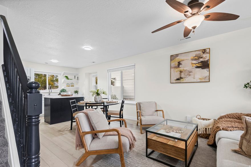 LIVE NEXT TO ONE OF SALT LAKE COUNTY'S FINEST LINKS COURSE!  This thoughtfully updated two-story home in the heart of Sandy features recent improvements including new flooring, fresh carpet, paint, and modern window coverings!  With a modern yet contemporary feel throughout, the main level features a bright, open layout anchored by a refreshed kitchen with white cabinetry and a contrasting dark island. The PRIMARY SUITE is large, with a bathtub that receives a MASSIVE amount of sunlight throughout the day.  The large windows in every other room offer WONDERFUL views of the Wasatch Range & the Oquirrh Mountains  depending on which side of the home you are on!  The fully fenced yard offers space for privacy and safety for children or paws.  Other than the aforementioned Gold Course, the Jordan River Parkway trails and a neighborhood parks are just minutes away, as well as I-15 and vast shopping and dining options.