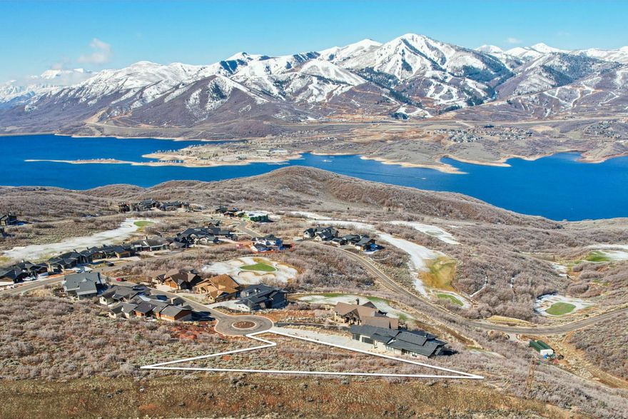 Nestled in the highly sought-after Hideout community, this exceptional lot offers a unique opportunity to build the home of your dreams surrounded by breathtaking natural beauty. Tucked away in a peaceful cul-de-sac, the lot boasts unobstructed, panoramic views of the serene Jordanelle Reservoir, the majestic Deer Valley East Village, and the towering Mount Timpanogos, creating a picture-perfect backdrop for your everyday life. Just minutes from the vibrant heart of Park City, you'll have access to world-class dining, boutique shopping, and year-round events, while Salt Lake City is only a short 35-minute drive away. For outdoor enthusiasts, Hideout Canyon is a treasure trove of recreational activities, featuring the scenic Outlaw Golf Course, miles of walking, biking, and snowshoeing trails, and close proximity to boating and skiing adventures. This community combines unparalleled views, a prime location, abundant recreational opportunities, and the presence of local wildlife to create a lifestyle that's as invigorating as it is serene. Whether you're seeking a tranquil retreat or an adventure-filled escape, this lot is the perfect canvas to craft a home that reflects your passions and aspirations.