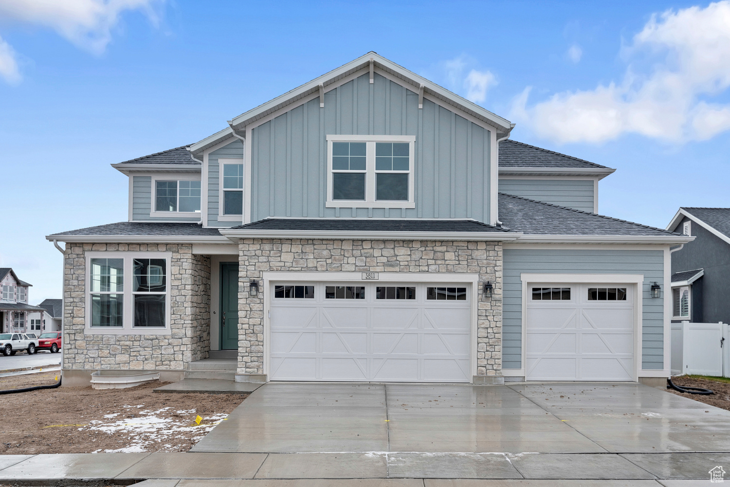 Beautiful brand new Midas Creek home in the great Holbrook Farms Lehi community!  This home combines modern elegance with functional design, perfect for today's lifestyle. The kitchen is a standout, featuring gray maple cabinets, sleek quartz countertops, tile backsplash, and platinum gas appliances, offering both style and practicality. This home includes laminate hardwood, tile, and carpet flooring, enhanced by can lighting and 2-tone paint for a polished interior. The spacious 3-car garage with exit door provides convenience and ample storage. Relax in the cozy ambiance of the gas log fireplace and enjoy timeless details like wood railing at the stairway and large Craftsman base and casing, The owner's bathroom features cultured marble shower surrounds and brushed & satin nickel hardware, creating a private retreat. With energy-efficient options and a 50-gallon water heater, this home seamlessly blends comfort, efficiency, and style for all your needs!