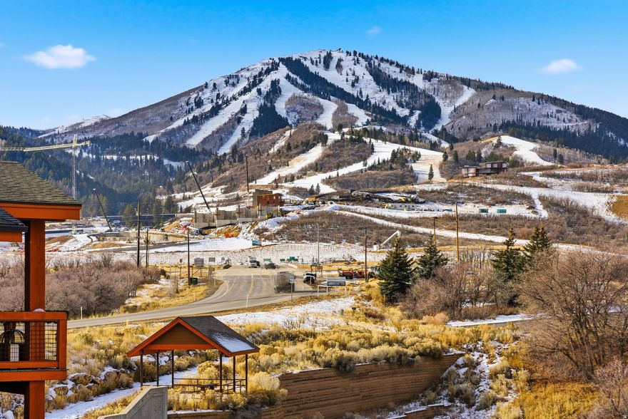 Location is just minutes from Deer Valley's massive East Village expansion, which brings seven new chairlifts, including the two-stage East Village Express gondola to Park City, and nearly 80 new runs. This adds 4,300 skiable acres right at your back door. This meticulously maintained 3-bedroom won't disappoint. It's located on the top floor (with elevator access to the 3rd floor). Walk into an open-concept floor plan featuring a vaulted great room with a beautiful fireplace, ski views, a contemporary kitchen with granite counters, Viking stainless steel appliances, a built-in wine and beverage cooler, and informal dining that completes this stunning space. Additional amenities include central vacuum, power shades, a Nest thermostat, central A/C, and a storage cage in the secure underground parking garage for skis, bikes, and other recreational gear. The spacious primary bedroom offers a walk-in closet and access to the large deck off the great room, where you can enjoy views of Deer Valley's ski runs and the lake. This fully furnished condo is perfectly located for access to Deer Valley East Village and everything it offers, as well as the recreation amenities of Jordanelle State Park, boating, jet skiing, paddleboarding, fishing, camping, and more. Nightly rentals are allowed, and the current rental history is strong. Why wait years for a new build when this condo is move-in ready today? A must-see property.