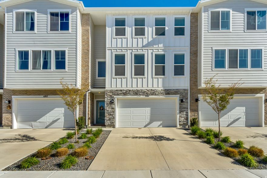 Beautifully decorated, brand-new townhome in the sought-after Brylee Farms community! This one-of-a-kind property features a rare LARGE garage that fits up to 4 small vehicles or 2 large trucks, with plenty of space for vehicles, toys, or a workshop. The bright and open second level is filled with natural light and offers a spacious kitchen perfect for entertaining. The third floor includes three bedrooms, a laundry area. The primary suite has a modern bathroom with a walk-in closet. This is the last home with direct access to the Brylee Farms playground and pickleball courts right from your back door. Enjoy community amenities including a pool, clubhouse, parks, trails, and basketball courts. Lender incentives check with listing agent. Square footage figures are provided as a courtesy estimate only and were obtained from county records.  Buyer is advised to obtain an independent measurement.   Square footage figures are provided as a courtesy estimate only and were obtained from county records.  Buyer is advised to obtain an independent measurement.