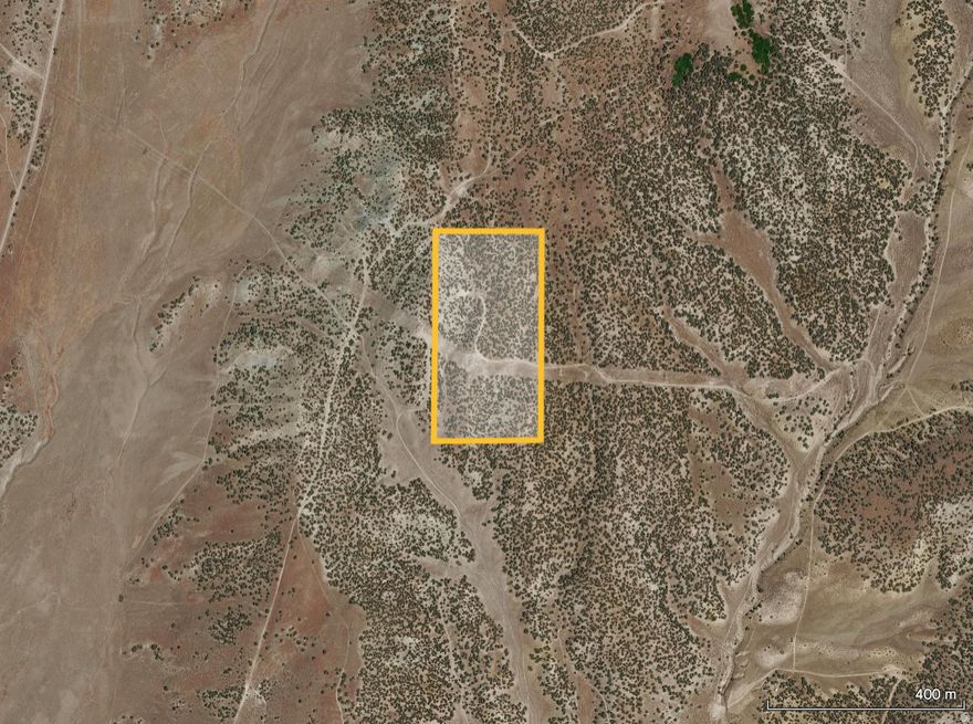 This property offers a unique opportunity for those looking for wide-open space and flexible land use. Comprised of raw land with no existing water rights, it is well-suited for grazing, recreational use, or as a long-term land hold. Access is provided via a dirt road, making it easily reachable while still maintaining a sense of privacy and seclusion. For buyers interested in securing water, nearby water shares have recently been available for purchase at approximately $20,000. The property also presents a great setting for off-roading and outdoor recreation, making it an ideal option for those looking to enjoy or invest in land with versatile potential.