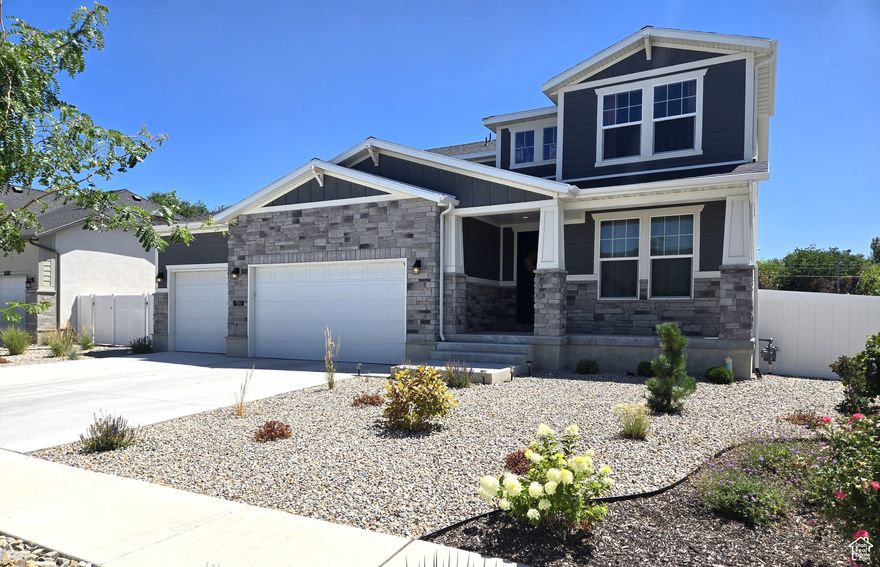 Come see this beautiful Craftsman Collection home in a great community that includes full  landscaping and a fenced yard. Amenities include 3 car garage with keypad, spacious box windows, cultured marble shower surrounds, stylish white laminate hardware, quartz counters, laminate hardwood flooring, stainless steel gas appliances, 2 tone paint, chrome hardware, green energy efficiency options, can lighting, Exterior Christmas light outlets and so much more! Landscaping maintenance is included in HOA fee. A must see!!!   Square footage figures are provided as a courtesy estimate only and were obtained from Tax Card.  Buyer is advised to obtain an independent measurement.