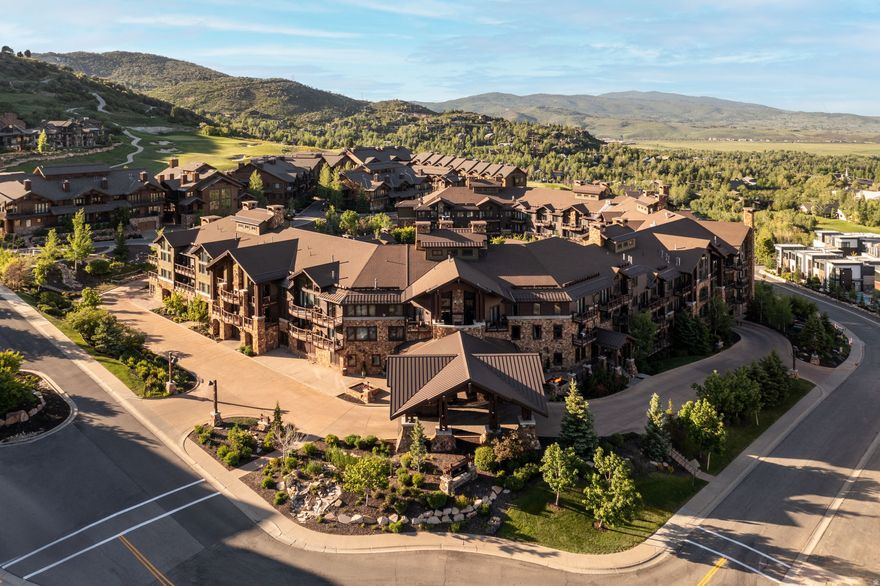 Discover an exceptional mountain residence at the Waldorf Astoria Park City, one of the most celebrated luxury resorts in the world. This two-bedroom condominium offers unmatched convenience with direct access to the resort grounds and effortless proximity to skiing, mountain biking, hiking, and the Canyons Village golf course. The home opens to beautifully maintained outdoor spaces and is just moments from the year-round heated pool, hot tubs, and a full suite of five-star hotel amenities. Owners enjoy access to the acclaimed Powder restaurant, a renowned spa and wellness center, an expansive fitness facility, business services, and the private Waldorf shuttle connecting you throughout Park City. Inside, you'll find a refined mountain-contemporary design featuring Viking appliances, stone countertops, a spacious dining area, and comfortable bar seating. Both bedrooms offer king beds, and the living area includes a king sleeper sofa for added guest flexibility. Three fireplaces create a warm, inviting atmosphere throughout, while the private patio allows you to step outside and enjoy fresh mountain air at any time. Designed with a lockout configuration, this residence provides exceptional flexibility for owners seeking personal enjoyment, rental income, or both. Opportunities to own a residence with this level of access, privacy, and luxury at the Waldorf are truly rare.