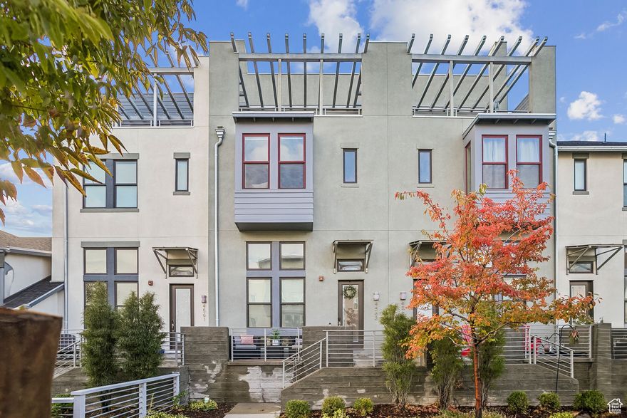 Welcome to this beautifully maintained townhome in the heart of Daybreak! With 3 bedrooms and 2.5 bathrooms, this home offers both style and space - including a finished basement, perfect for a media room, gym, or person-cave. The main floor boasts an open-concept layout, granite countertops, stainless steel appliances, and ample natural light. Upstairs, enjoy a spacious primary suite with a walk-in closet and en-suite bath, plus two additional bedrooms and a full bath. Enjoy the convenience of upstairs laundry and a 2-car attached garage. Located steps from trails, parks, TRAX, and Daybreak's vibrant shopping and dining, this home blends low-maintenance living with a dynamic community lifestyle. Don't miss this move-in ready gem!