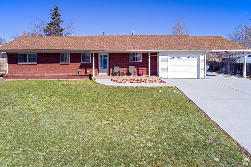 Don't miss out on this cozy 3-bedroom, 2-bathroom home, with many recent updates including new paint, laminate flooring, interior doors, ceiling lights and fans, double cement driveway and walkway, added carport with roof attached to the home, outdoor motion lights, and an electric cooktop. The family room, bathed in natural light from the expansive windows offers views of the spacious backyard complete with a shed and a majestic pine tree. There is no shortage of parking space with the double driveway, large carport, and extra wide road for plenty of roadside parking as well as ample storage space adjacent to the garage and in the backyard shed.