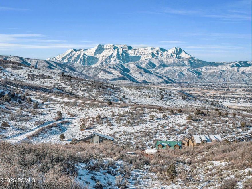Rare flat lot that is ready to build with unobstructed views!  Four bedroom septic feasibility has just been approved with Wasatch County, saving you tons of time and steps in the building process. Enjoy breathtaking views of Mount Timpanogos and the entire Heber Valley  from this stunning 1-acre lot in the highly sought-after Timber Lakes community, just minutes from the newly expanded Deer Vallley East Village.  This property offers year-round access with utilities conveniently available, making it ideal for building your dream home or mountain retreat. This property backs community open space and is close to hiking and walking trails.