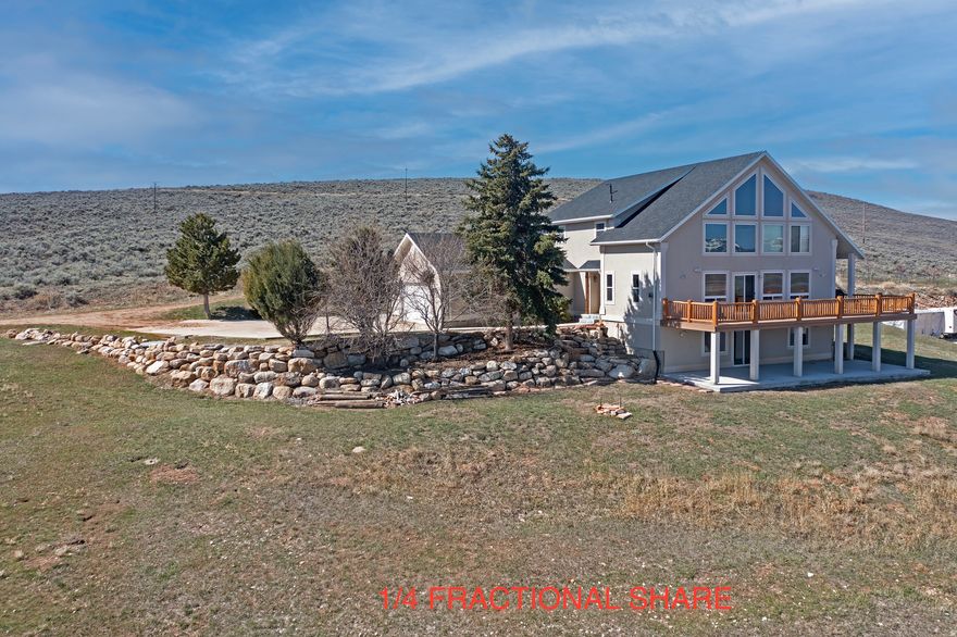 Own a 1/4 share of this beautiful custom home overlooking Big Creek and Bear Lake. Located in  Last Chance Sub in Laketown Utah, minutes to Rendezvous Beach, Cottonwood Canyon and Temple Flat Canyon, First Point boat ramp and east side for lots of recreational options. Boating, ATV/UTV, snowmobiling, snowshoeing, hiking, cycling and mountain biking.  Six bedrooms, four bathrooms, three levels, large deck and patio. Great vacation home!