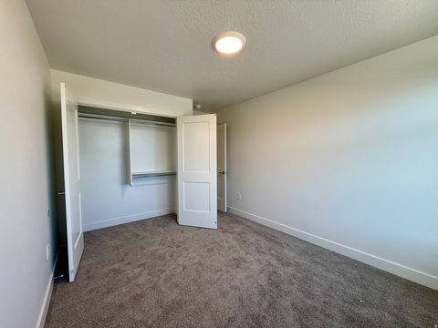 Tiny photo for 2829 W GUERNSEY LN #218, Plain City, UT 84404 (MLS # 2146727)