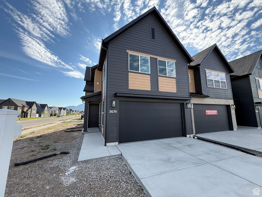 Move-In Ready! This stunning end-unit townhome in the popular Green Farm community of West Haven is complete and ready for you. With an open layout, large windows, luxury vinyl plank flooring, and elegant finishes, this home blends modern style with everyday functionality.  The kitchen features quartz countertops, two-tone cabinetry, a spacious island, herringbone backsplash, and stainless steel appliances-perfect for both daily living and entertaining.  Enjoy Green Farm's amenities, including walking trails, pickleball courts, a playground, a fishing pond, and a dog park.  Limited-Time Incentive: Get a 2% lender credit with our preferred lender, usable toward closing costs or a rate buydown.  Schedule your private tour today and make this new home yours!