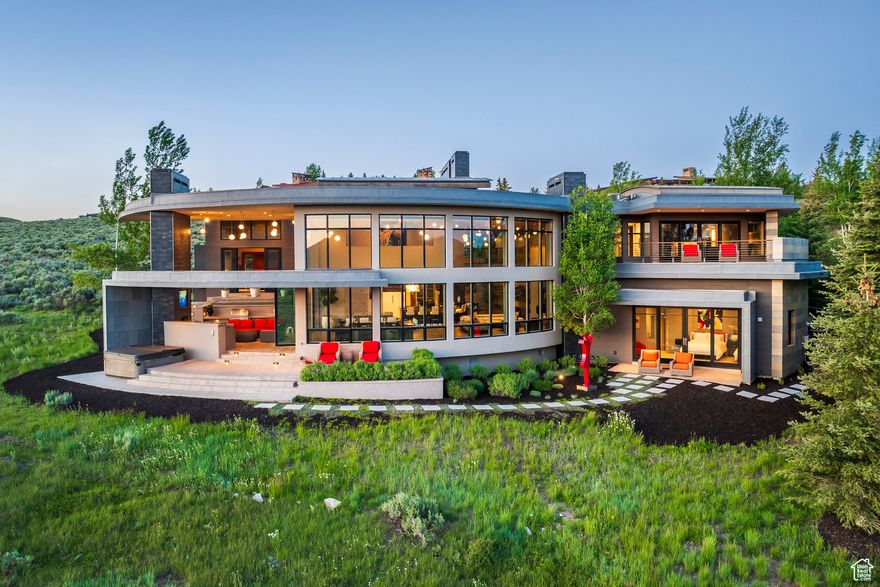 A Clive Bridgwater masterpiece of Architecture in Promontory.  Full Golf Membership. Furnishings included. Situated on a spectacular 3.52 acre lushly landscaped lot with tremendous expansive views of the Wasatch Mountains, ski resorts and unmatched privacy in Promontory this home is truly a unique gem with a level of finishes and included furnishings that you have not seen in Park City. Crafted by renowned builder Don Craig. Glorious cheerful and happy. Fashionable and luxurious. Staggering and beautiful. Spacious, poetic and art filled. Marvelous and magnificent. Impressive and sensuous. Indefinable but entirely unmistakable. Distinctive and delightful. Exciting and smashing. Rousing and striking. Joyful and welcoming. Tasteful and splendid. Romantic and ethereal lighting. Fully oxygenated master bedroom suite.