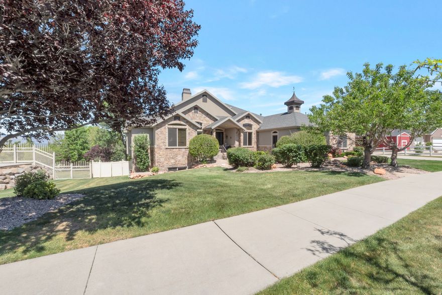 This beautiful Draper estate offers something rare - space and flexibility for the whole family. With a full private apartment/suite on each level, four kitchens, large master suite, and three laundry rooms, multigenerational living has never felt so effortless. The gourmet kitchen and wraparound deck frame breathtaking Salt Lake Valley views, while the walk-out basement delivers the ultimate hangout space. Tucked between two beloved Draper trails, with a 5-car garage and main-level living, this home is as practical as it is beautiful.  Pool is an added bonus. Owner/Agent