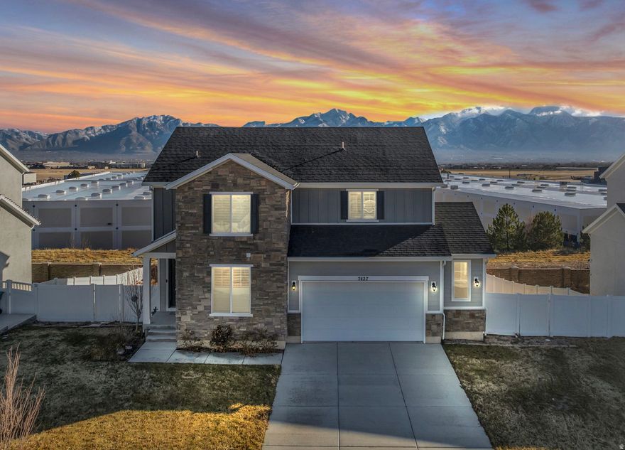 Priced to sell this home is located in a quiet West Jordan neighborhood, this well-designed home offers 4 bedrooms, 3.5 bathrooms, and an open loft ideal for an office or flex space. The open-concept layout connects the living, dining, and kitchen areas and is filled with natural light. The kitchen features double ovens, and the primary suite includes a walk-in closet and private bath. Enjoy outdoor living on the patio with unobstructed Wasatch Mountain views. The finished basement has a separate entrance, offering added flexibility. Complete with a two-car garage and convenient access to schools, parks, and shopping. Buyer to verify all information; figures provided as a courtesy from county tax records.