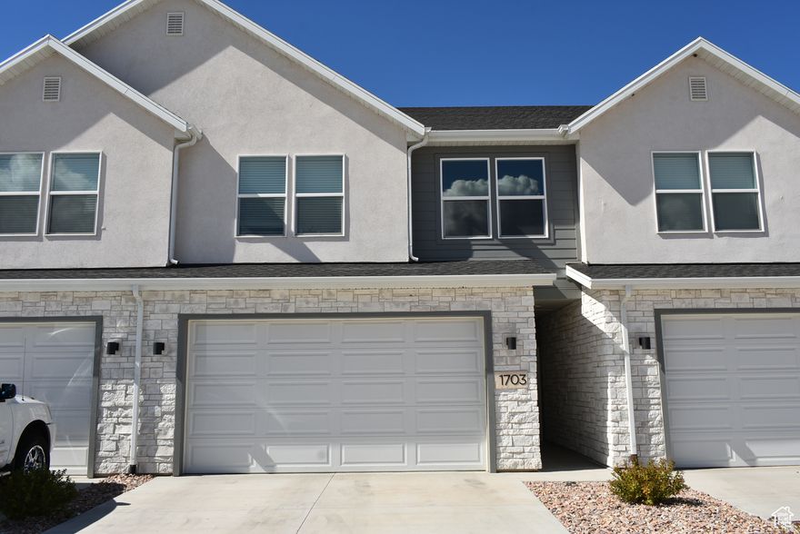 Fantastic townhome located in Summer Springs HOA community in Salem, UT.  Kitchen features quartz countertops, center island lots of cupboard space with soft close cabinets and drawers plus a kitchen pantry.  Laminate flooring on the main floor, open design, back yard patio and 2-car garage with epoxied flooring. 1/2 bath located on the main level as well.  Upstairs you will find a large Owner's suite with its private full bathroom and large walk-in closet.  There are 2 more bedrooms located on this level, an additional full bathroom and convenient laundry room.  The back yard is accessed through the sliding glass door and has a cement patio.  The HOA features a pool, BBQ area, pavilion and playground.    Square footage figures are provided as a courtesy estimate only and were obtained from Utah County Records.  Buyer is advised to obtain an independent measurement. Agent is related to the Seller.