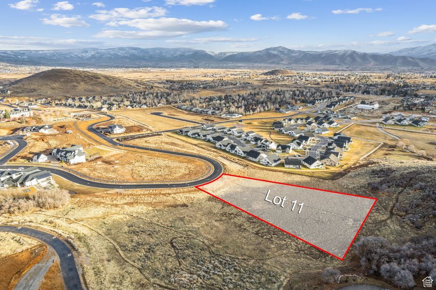 Lot #11. Enjoy 1.31 acres of one of the best locations in Midway! The Reserve is a fully designed and planned community consisting of 48 custom estate homesites surrounded by 30 acres of lush open space. Signature amenities include miles of walking trails, waterfalls, sports court, pool, viewing deck, and family gathering places. This breathtaking location boasts panoramic views of historic farms, Snake Creek Canyon, Deer Creek Reservoir, and the majestic Mount Timpanogos, while providing the exclusivity and serenity one desires in luxury living. This extraordinary opportunity only comes around once in a lifetime. Bring your own architect and designer! Click on the ''View Tour'' link to visit the community website! 3D renderings are one example of home orientation on the lot.