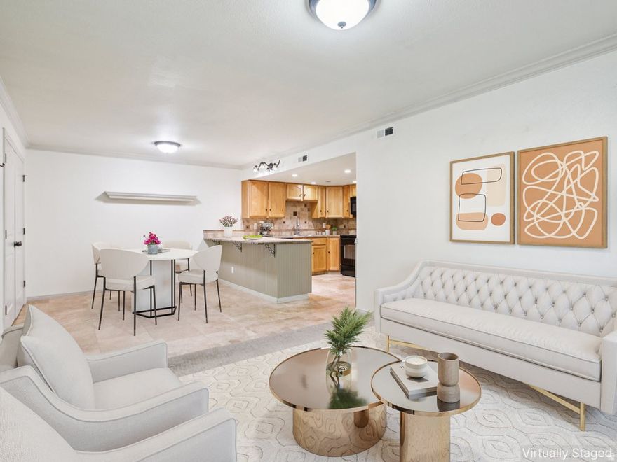 GET UP TO 6 MONTHS PREPAID HOA DUES! This beautifully renovated main-level condo is a gateway to the best of Utah. Minutes from the mouth of Big and Little Cottonwood Canyons and with instant freeway access, your mountain adventures are closer than ever. The stunning interior features a wide-open floor plan highlighted by a gourmet kitchen with new cabinets, appliances, and a massive wrap-around granite countertop. Enjoy the ease of main-level living with your covered parking spot and the community pool just steps from your front door. Recent upgrades include a new roof and exterior paint, plus a new washer and dryer, thermostat, and disposal. Walk to Wheeler Farm, local dining, and grocery stores. This is low-maintenance and ultra convenient east-side living at its best! *Mortgage Savings Available with Preferred Lender.