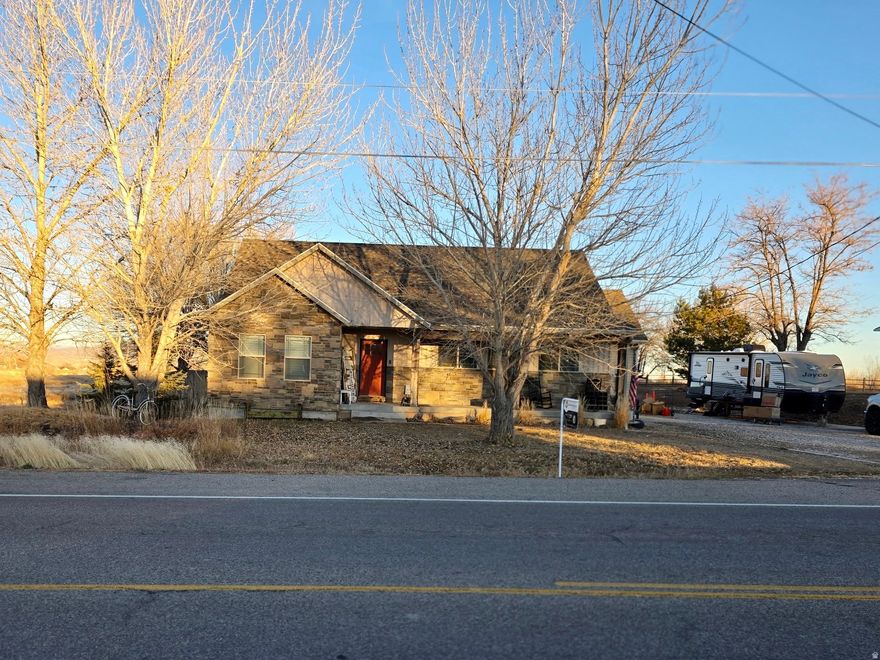 Country living just minutes from town! Beautiful home with plenty of space to grow and entertain. Enjoy the views of Split Mountain from the back patio, as you enjoy your morning coffee, and the sunsets over Asphalt ridge from the front porch. Sqft and lot size is courtesy estimate only, buyer to verify all info.