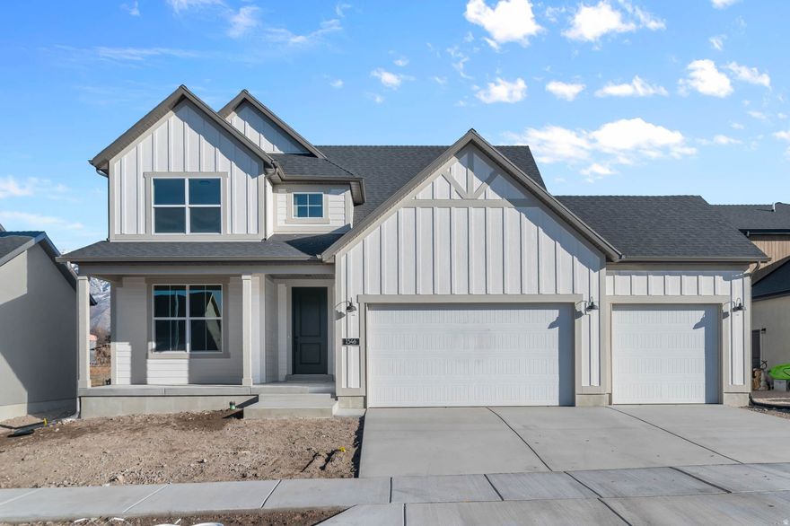 Brand new 2050 Farmhouse home in a great Provo with beautiful lake views! Features include crisp white laminate cabinets, quartz countertops, and stainless steel gas appliances - a kitchen designed for both elegance and everyday use. The home's flooring blends laminate hardwood, tile, and carpet, combining durability with comfort throughout. A roomy 3-car garage with keypad and exit door adds convenience and ample storage. Natural light floods through a box window in the kitchen nook, while can lighting and Christmas light outlets add charm and practicality. The home also includes a tankless water heater and energy-efficient features to keep utility costs down. Interior details like metal railing at the stairway, Craftsman base and casing, and black matte hardware bring modern refinement. The owner's bathroom is a true retreat with cultured marble shower surrounds, emphasizing both comfort and style. Come check it out today!  Whether for family living or entertaining, this 2050 Farmhouse delivers a perfect balance of timeless design, smart upgrades, and everyday functionality.