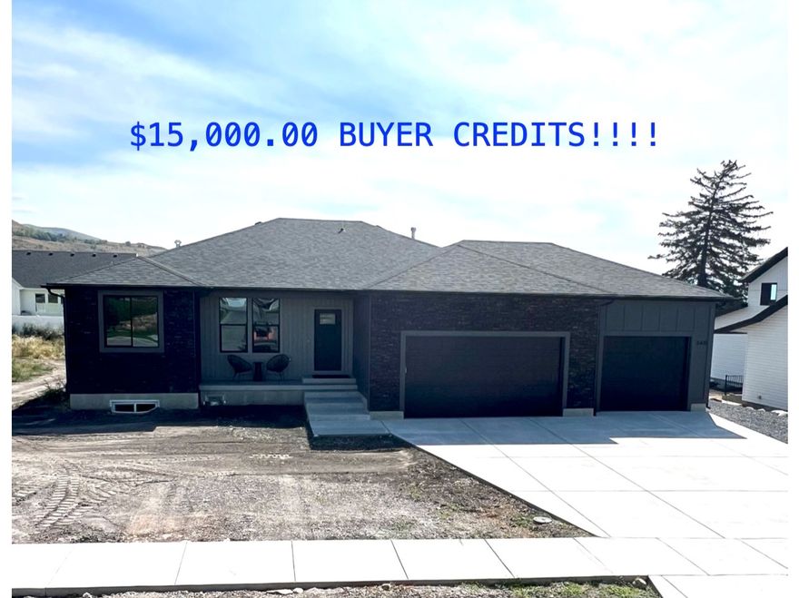 Motivated Seller! Seller is offering a $15,000 credit at closing, which the buyer may apply toward an interest rate buy-down, closing costs, or even a landscaping allowance. This home stands out in its price range with luxury features often considered upgrades. The deeper garage provides extra space for trucks, storage, or a workspace, while the RV pad offers additional flexibility for parking or recreation. Inside, upgraded flooring, custom railing, and tall ceilings create an open, airy feel. Oversized windows fill the daylight basement with natural light and frame beautiful garden views. The oversized deck is ideal for entertaining or simply enjoying the mountain scenery. Thoughtful details, premium finishes, and generous spaces highlight the quality craftsmanship throughout. Located just five minutes from Cherry Peak Resort, this home combines refined living with convenient access to outdoor recreation.