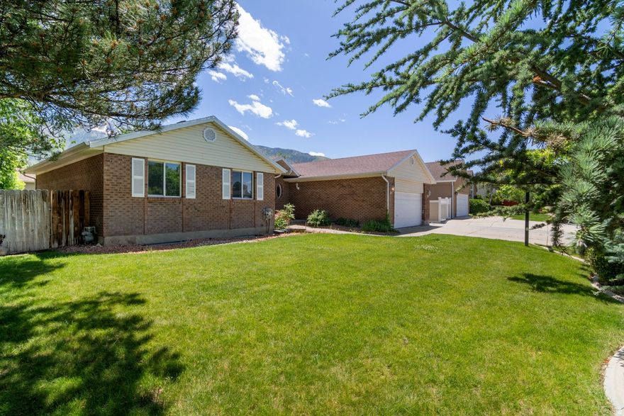 Rare opportunity in a highly sought-after Sandy neighborhood! This 6-bedroom, 3-bath rambler offers over 3,200 sq ft, mountain views, vaulted ceilings, oversized windows, and beautiful mature landscaping. The home has great bones and incredible potential for buyers looking to personalize and modernize a property in an area where updated homes hold strong value. Architectural features like vaulted ceilings, exposed beams, and the potential for an open-concept kitchen/family room design create exciting possibilities for customization. Whether you're looking to build sweat equity, create your forever home, or invest in a property with upside potential, this is an opportunity worth seeing.