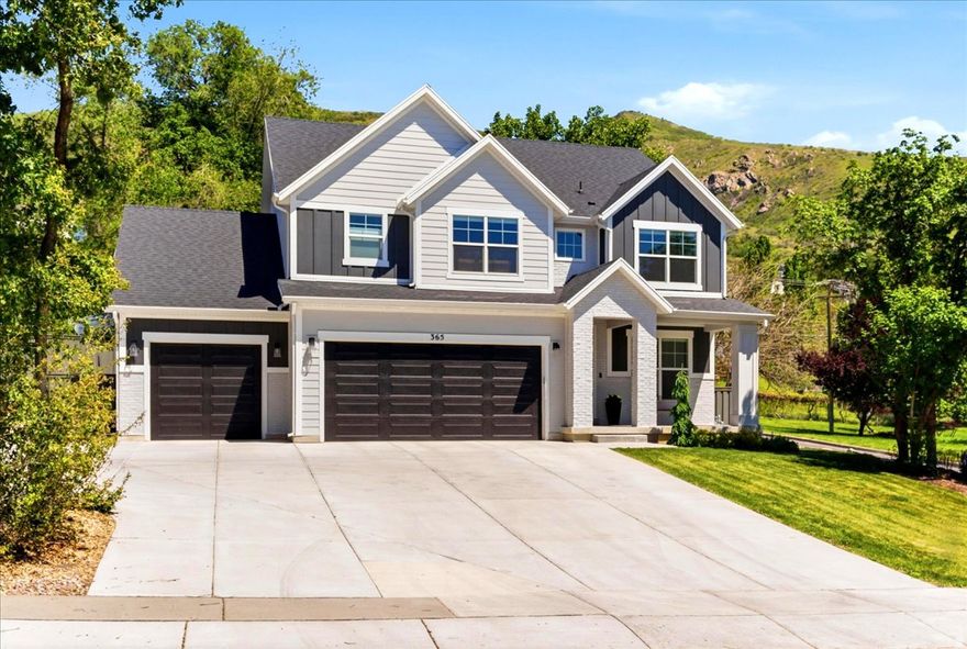 Experience this home through the attached virtual tour video before scheduling your private showing. Step Into Luxury on the Prime East Bench of Fruit Heights Built in 2023, this stunning custom home offers like-new luxury paired with the warmth and comfort of home. With 7 bedrooms and 4 bathrooms, the thoughtfully designed layout provides spacious, functional living for today's lifestyle. From the moment you enter, you'll notice the quality craftsmanship and upscale finishes throughout, including quartz countertops, stainless steel appliances, high-end LVP flooring, and exceptional attention to detail in every element of the finish work. The open-concept kitchen and family room create the true heart of the home - perfect for gathering, entertaining, or relaxing by a cozy fire while enjoying the peace and quiet of this mountainside setting. The primary suite is a luxurious private retreat, featuring double sinks, a separate shower, soaking tub, private water closet, and a bright, cheerful walk-in closet designed for both comfort and function. The home's thoughtful design continues with convenient second-floor laundry located near the bedrooms for everyday ease. Downstairs, the basement family room with wet bar provides the ideal space for entertaining, movie nights, or hosting guests, while abundant storage ensures everything has its place. Step outside to a custom-designed yard featuring a garden with drip system, exterior landscape lighting, and beautiful natural surroundings that create exceptional privacy. The custom shed, perfectly matched to the home's style and paint, includes AC power and offers potential for a 30-amp RV outlet, complementing the private RV parking with easy side-road access. With outstanding pride of ownership, this home truly feels like buying new - without the new-construction price tag. This home is steps away from "Bair Canyon" offering amazing Mountain hiking, "Fruit Loops Biking Trail" with hiking and outstanding biking trails, & "Nicholls Park" one of the most popular parks in Davis County with play areas, fields, & picnic terraces. Located near top-rated Davis County schools including Davis High School, and offering quick access to shopping, dining, and multiple freeway connections, this home combines luxury, convenience, and location. Schedule your private showing today. Square footage figures are provided as a courtesy estimate only and were obtained from County & builder plans . Buyer is advised to obtain an independent measurement.