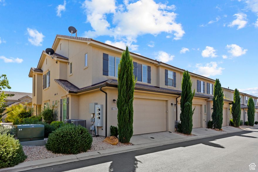 HUGE PRICE DROP!!!!!!!! Step into comfort and convenience with this fully furnished, completely turnkey Airbnb retreat-featuring a SPACIOUS MASTER SUITE ON THE MAIN LEVEL for ultimate ease and relaxation. This stunning townhome in the heart of Washington, Utah, is your ideal vacation retreat or investment opportunity. Nestled in a quiet and desirable neighborhood, this beautifully designed 3-bedroom, 3.5-bath home features a spacious open floor plan, stylish decor, and all the comforts of home - just minutes from Zion National Park, Sand Hollow Reservoir, and St. George. Enjoy the modern kitchen with quartz countertops, stainless steel appliances, and a large island perfect for gathering. The inviting living area flows seamlessly to a private patio, ideal for relaxing after a day of hiking or boating. Upstairs, you'll find generous bedrooms including a luxurious primary suite with walk-in closet and en-suite bath. Whether you're seeking a personal escape or a high-performing vacation rental, this property is turn-key ready. From comfortable furnishings to thoughtful touches throughout, every detail is designed for relaxation and convenience. Don't miss your chance to own a piece of paradise at 1914 Fiesta Lane - where style meets adventure in Southern Utah!