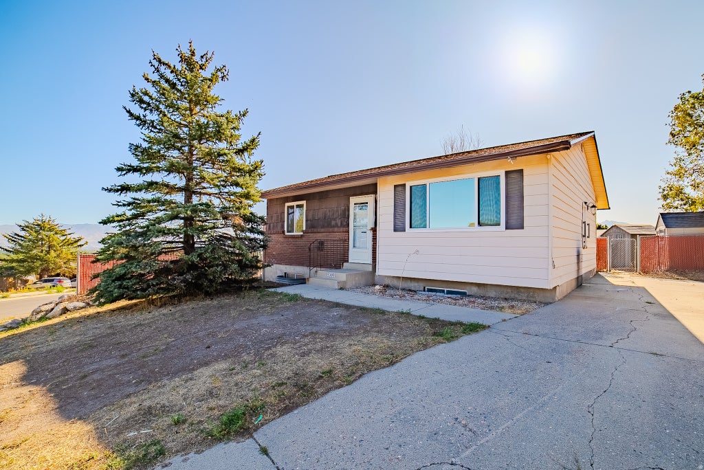 Photo of 5309 W LEWIS CLARK DR S, Salt Lake City, UT 84118 (MLS # 2185543)