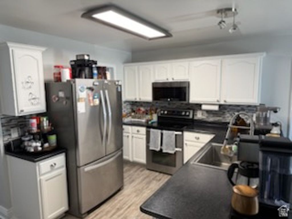 Photo of 1969 S 575 E, Clearfield, UT 84015 (MLS # 2146521)