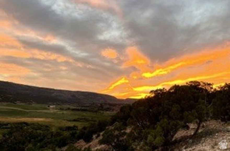 Escape to your own private mountain retreat in Fruitland, Utah! This beautiful just-under-4-acre property overlooks the stunning Current Creek Valley, offering breathtaking panoramic views, unforgettable sunrises, spectacular sunsets, and incredible year-round stargazing. With water, power, and a septic tank already in place, this property is ready for multiple-family camping, your dream cabin, or a full-time residence for peaceful permanent living. Enjoy full winter access with no HOA fees, giving you the freedom to truly make this property your own. Surrounded by endless outdoor recreation including fishing, boating, hiking, ATV riding, horseback riding, hunting, and nearby access to Strawberry Reservoir, Starvation Reservoir, and countless public lands, this is the perfect escape for adventure and tranquility alike. Whether you're looking for a weekend getaway or your forever mountain home, this rare Fruitland property offers the lifestyle you've been dreaming of.