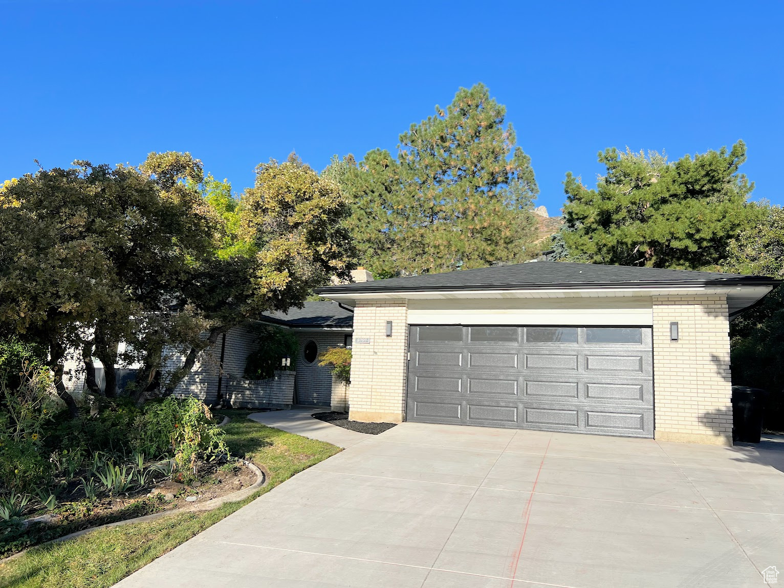 New 3 Car Wide Driveway with New RV Parking. New Basement Kitchen mother in law. Brand New 30 yr architectural shingle roof. New Garage Door & Opener. New Front Door. Gourmet Kitchen with Double Ovens. New Rain gutters. New Basement Bathroom with Double Sink Vanity & Custom Tile. Located near little cottonwood canyon just off Wasatch Blvd. Close to hiking & Skiing. Plantation Shutters. New Stainless Steel Appliances & New LVP floor in Basement.