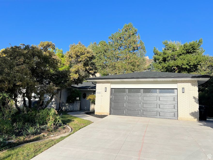 New 3 Car Wide Driveway with New RV Parking. New Basement Kitchen mother in law. Brand New 30 yr architectural shingle roof. New Garage Door & Opener. New Front Door. Gourmet Kitchen with Double Ovens. New Rain gutters. New Basement Bathroom with Double Sink Vanity & Custom Tile. Located near little cottonwood canyon just off Wasatch Blvd. Close to hiking & Skiing. Plantation Shutters. New Stainless Steel Appliances & New LVP floor in Basement.