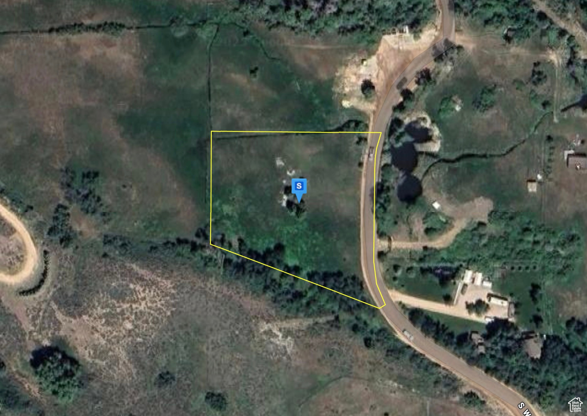 Nestled in the gated, year-round accessible Woodland Estates Subdivision, this 1.4-acre lot offers a flat, build-ready setting surrounded by mature trees. Water rights are tied to the community, providing added value and access to the area's resources. Conveniently located just 7 minutes from Kamas and 25 minutes from all that Park City has to offer, this property is perfectly positioned for four-season recreation, with nearby National Forest trails and world-class fly fishing, making it an ideal base for outdoor enthusiasts.