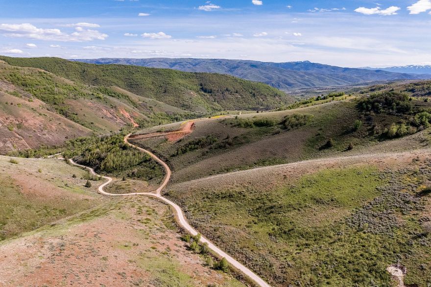 HUNTER'S PARADISE! Tucked within the gated community of Beaver Creek Estates, this 5-acre recreational property offers the perfect mountain escape east of Ogden Valley on the scenic route toward Monte Cristo. Surrounded by native sagebrush and natural Utah landscape, this hillside parcel features beautiful mountain views, incredible privacy, and some of the darkest skies in Northern Utah - perfect for stargazing beneath a blanket of stars. Enjoy camping, wildlife sightings, and hunting opportunities within the community while the HOA maintains the private roads and gated access for added convenience. A rare opportunity to own your own recreational retreat in the mountains. Call listing agent for access.