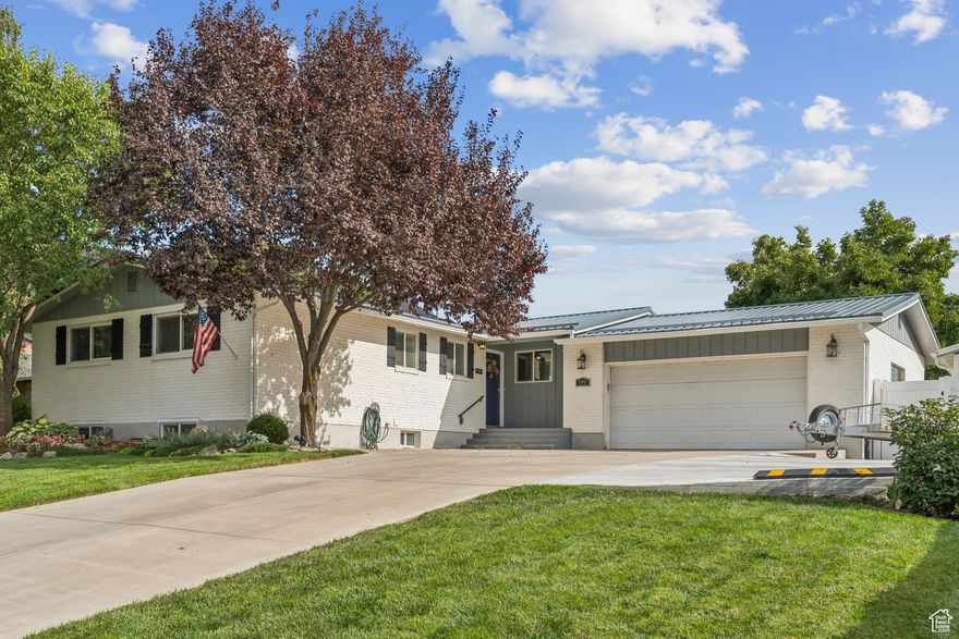 Don't miss out on this wonderfully kept Kaysville home. Step inside to be greeted by a kitchen complete with granite countertops and stainless steel appliances. This home also features spacious bedrooms, all vinyl windows, and updated lighting. Outside, enjoy the large backyard with its mature trees under the shade of the covered patio. Never run out of room with the included large shed. Located within the boundaries of a dual language immersion elementary school, and super convenient to highway 89.