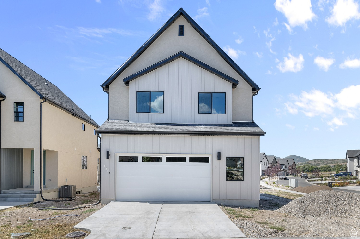 Beautiful brand new Stockholm home plan that combines contemporary style with functional living space! Featuring a modern kitchen with gray maple cabinets, quartz countertops, tile backsplash and stainless steel gas appliances, this home is crafted for both elegance and efficiency. The laminate hardwood, tile, and carpet flooring ensure durability and comfort throughout, Also designed with modern convenience in mind, the finished basement space provides additional living or entertainment areas. Can lighting, Christmas light outlets, and energy-efficient options enhance everyday living, while the 40-gallon water heater ensures consistent comfort. Stylish details like the metal railing at the stairway, 2 tone paint and craftsman base & casing elevate the home's design. In the owner's bathroom, quartz shower surrounds and black matte hardware create a sophisticated retreat. Comes fully landscaped and maintained by the HOA for a hassle free, turn key experience!
