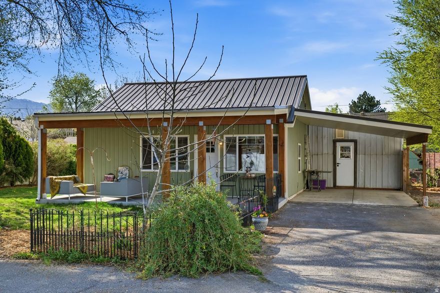 This beautifully updated historic cabin blends 100yearold charm with modern comfort, Freshly painted interior featuring a fully permitted 2017 architectdesigned addition with vaulted ceilings that creates a bright, efficient singlelevel layout. Maintenance free exterior & roof. The home offers 3 bedrooms and 2 bathrooms, private patio access from both addition bedrooms, LVP flooring, and organized closets. Ecofriendly design elements include large southfacing windows and a 16panel solar array for exceptionally low power bills 25 yr warranty. Major upgrades in 2017 include highefficiency HVAC, All New plumbing & main water line sleeve. All new electrical (with underground supply)& Hardwired smoke & Co2 alarms (in addition). Energyefficient vinyl windows, a metal roof, and full boardandbatten vinyl exterior. The kitchen features Diamond softclose cabinetry and new gas oven.  Hall bath includes heated tile, jetted tub and a rainstyle shower. A centrally located laundry room with cedar shelving and floor drain adds convenience. The landscaped yard offers mature trees, perennials, and lowwater design. Located in a quiet Cul-de-Sac, friendly neighborhood with easy access to TRAX, shopping, restaurants, Wheeler Farm, Union Park, and local schools. This moveinready home delivers historic character, modern efficiency, and lowmaintenance living .RV and lots of off street parking. No HOA.