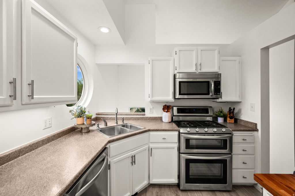 Photo of 7635 S LARK MEADOW CV, Midvale, UT 84047 (MLS # 2153960)