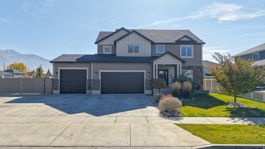 Welcome to your dream home in beautiful Springville, Utah! This stunning property sits on a spacious corner lot and offers breathtaking mountain views with peaceful proximity to protected wetlands, walking trails, and neighborhood parks. Step inside to discover a bright, open floor plan perfect for entertaining, featuring granite countertops, double ovens, and a large kitchen island that flows seamlessly into the living area. Cozy up by the fireplace featuring custom built-in cabinets, plantation shutters, and abundant natural light throughout. The newly finished basement provides additional living space with laundry hookups both upstairs and downstairs, perfect for convenience or multi-generational living. The master suite offers a relaxing soaker tub, large closets throughout, and beautiful finishes. With tons of parking, a 3-car garage, and a quiet, friendly neighborhood, this home truly has it all. Come experience the perfect blend of comfort, functionality, and natural beauty. Basement has been fully finished.   *don't forget to check out the Matterport tour!