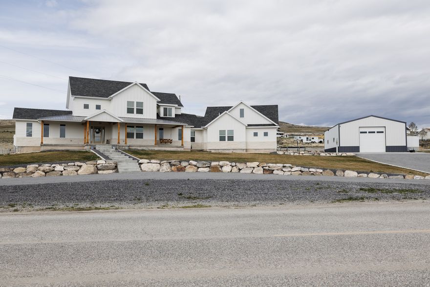 This is the home you have been waiting for. Nearly 6,000 sqft,  FULL of upgrades, and top of the line features. ADU, 30x50 shop, endless parking, views of the valley, and so much more. Minutes from I-15 and I-84 makes this location ideal. I cannot fit what this home has to offer in the description, you must see in person. Call for any and all question or to schedule an appointment!