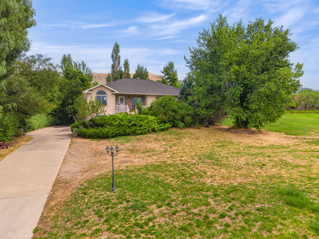 Photo of 4380 S MAIN ST, Nibley, UT 84321 (MLS # 2181796)