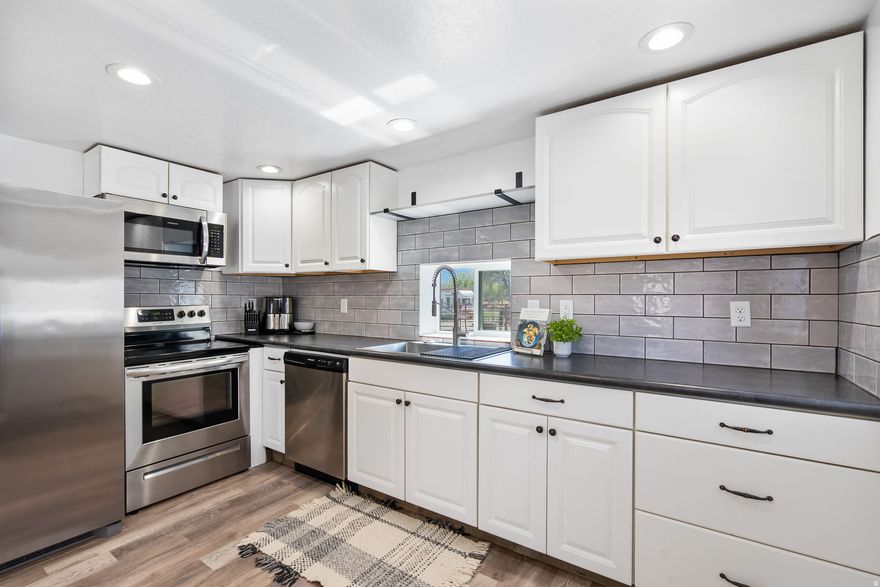 Affordable, updated, and ready to go! This fully remodeled home features new electrical and plumbing, giving you the peace of mind of major upgrades already being done.  Sitting on a private corner lot, there's room to spread out and make it your own. Need space for projects, animals, or storage? You've got it-a detached shop plus a carport/haybarn make this property as functional as it is affordable.  If you've been looking for value without sacrificing updates or space, this one checks all the boxes.